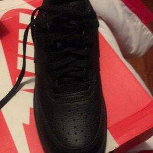 Brand new never worn black uptown Nike